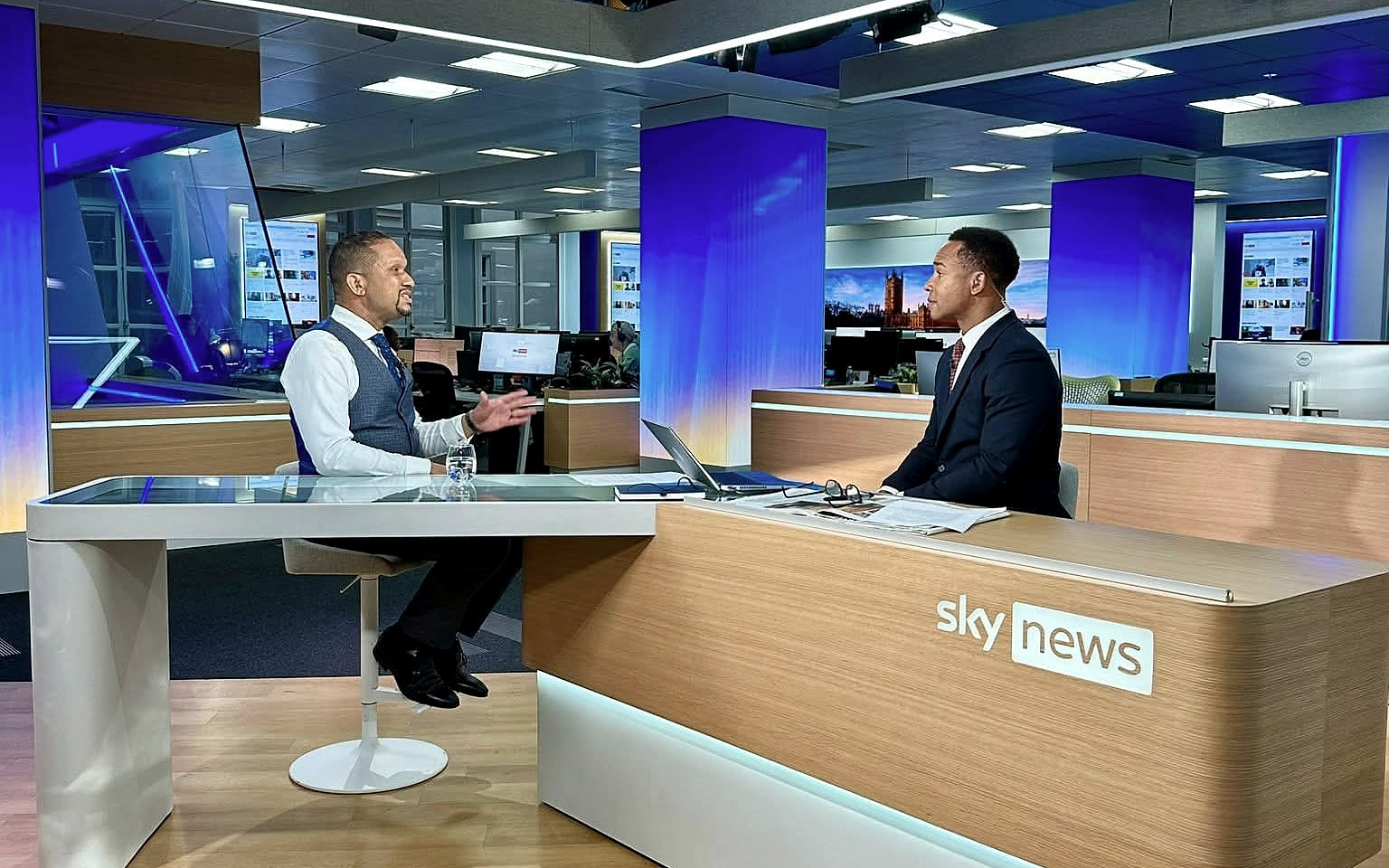 Louis Stedman-Bryce being interviewed at the Sky News studio desk.